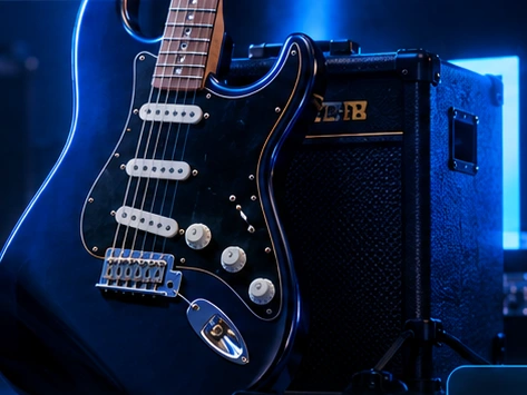 Gitara elektryczna i wzmacniacz na ciemnej scenie
